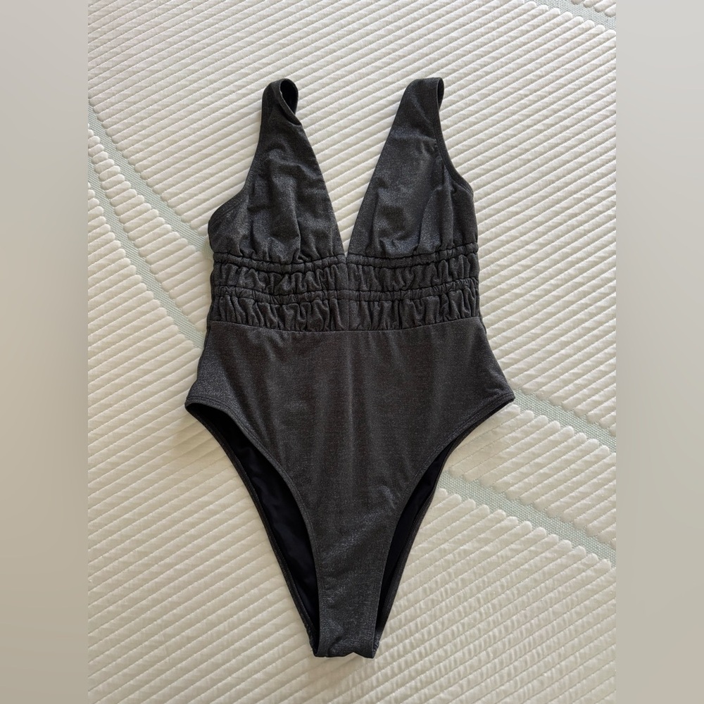 Sleek Black One-Piece Swimsuit with Ruched Waist